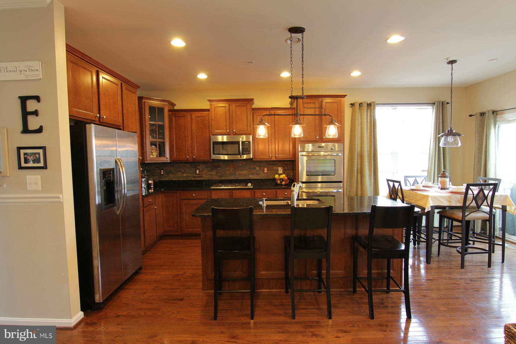 2651 Shade Branch Road Hanover, MD 21076 - Photo 2 of 30 a kitchen with lots of counter space and appliances