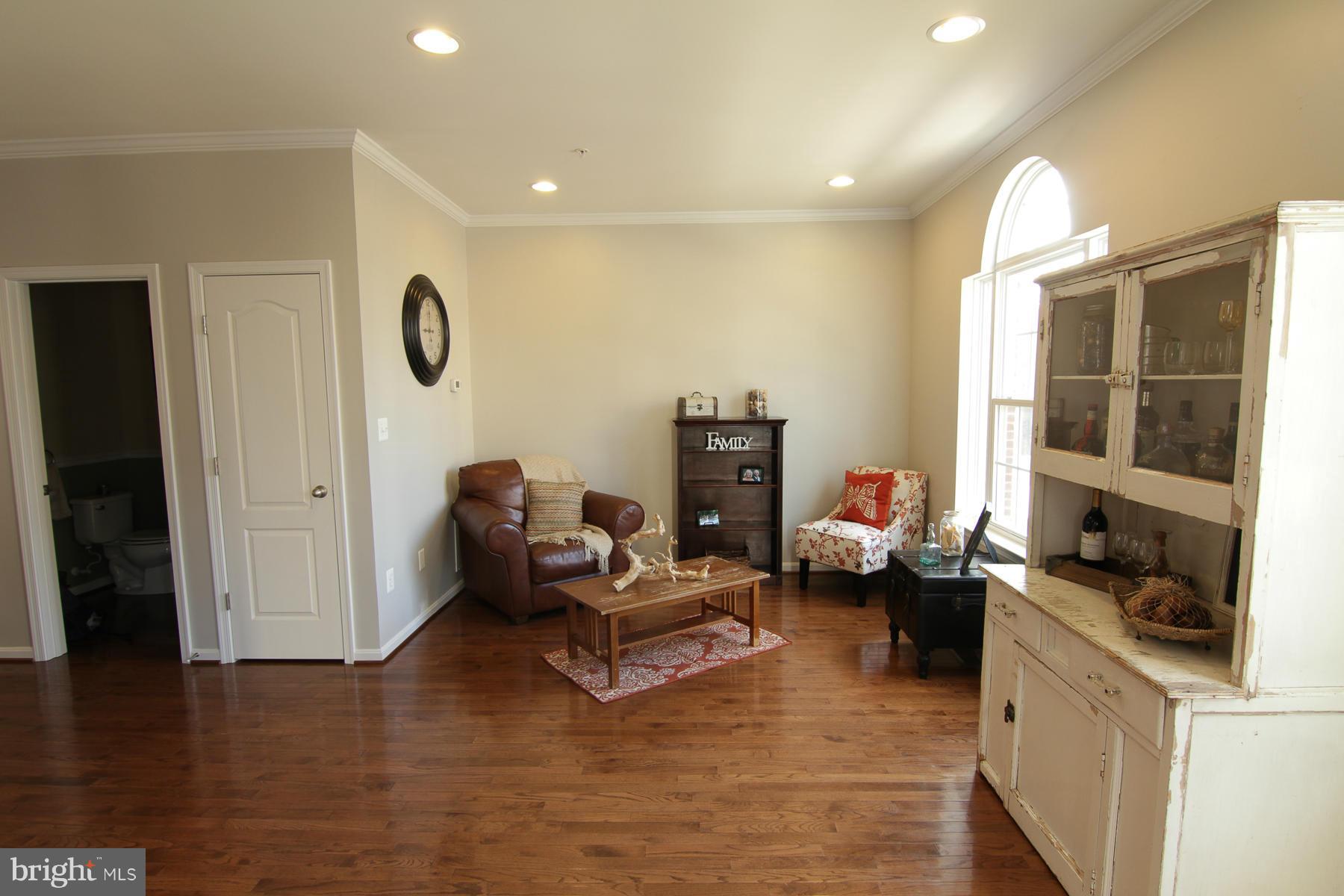 2651 Shade Branch Road Hanover, MD 21076 - Photo 12 of 30 a living room with furniture and a large window