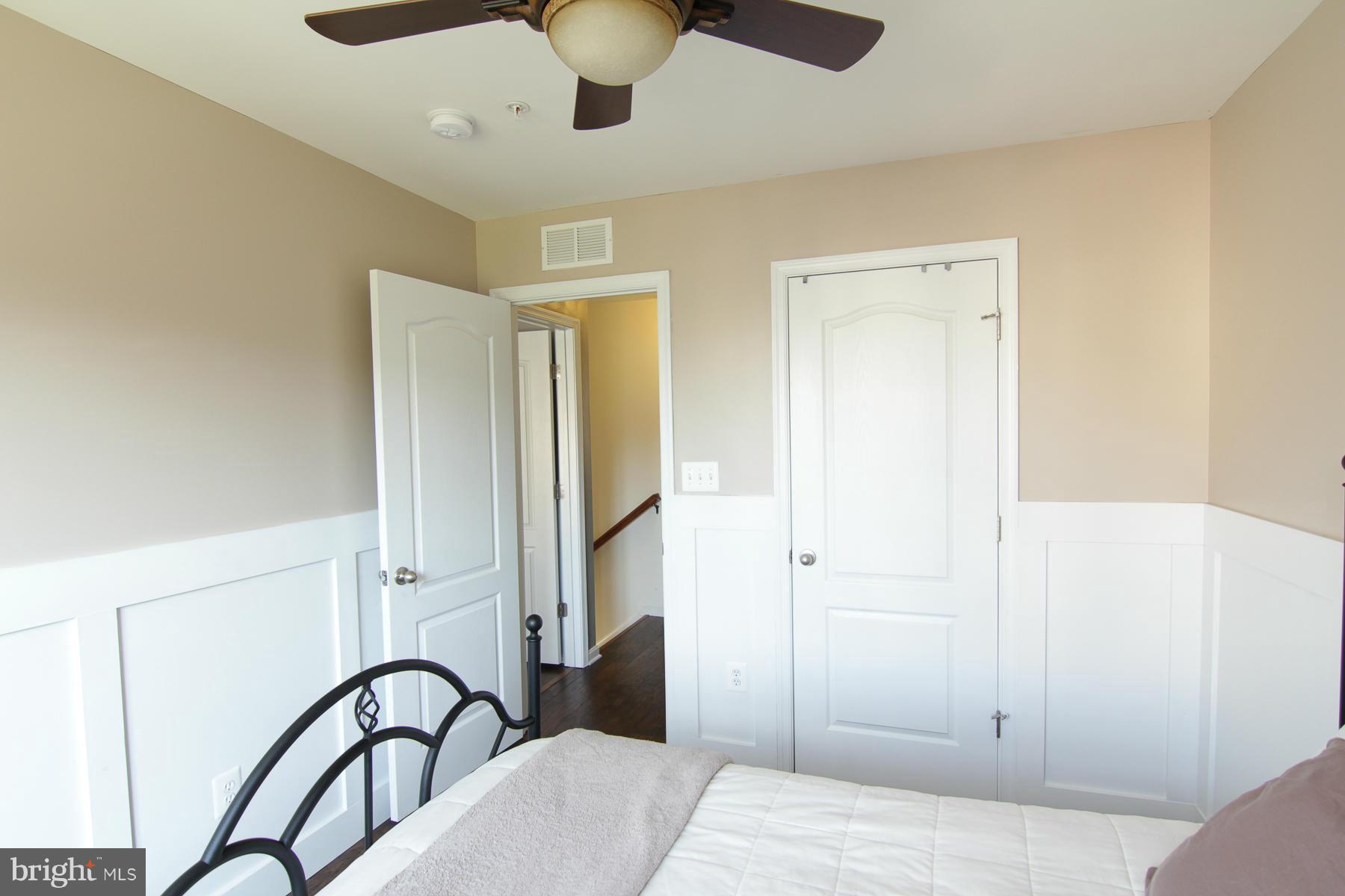 2651 Shade Branch Road Hanover, MD 21076 - Photo 15 of 30 a bedroom with a bed and a dresser
