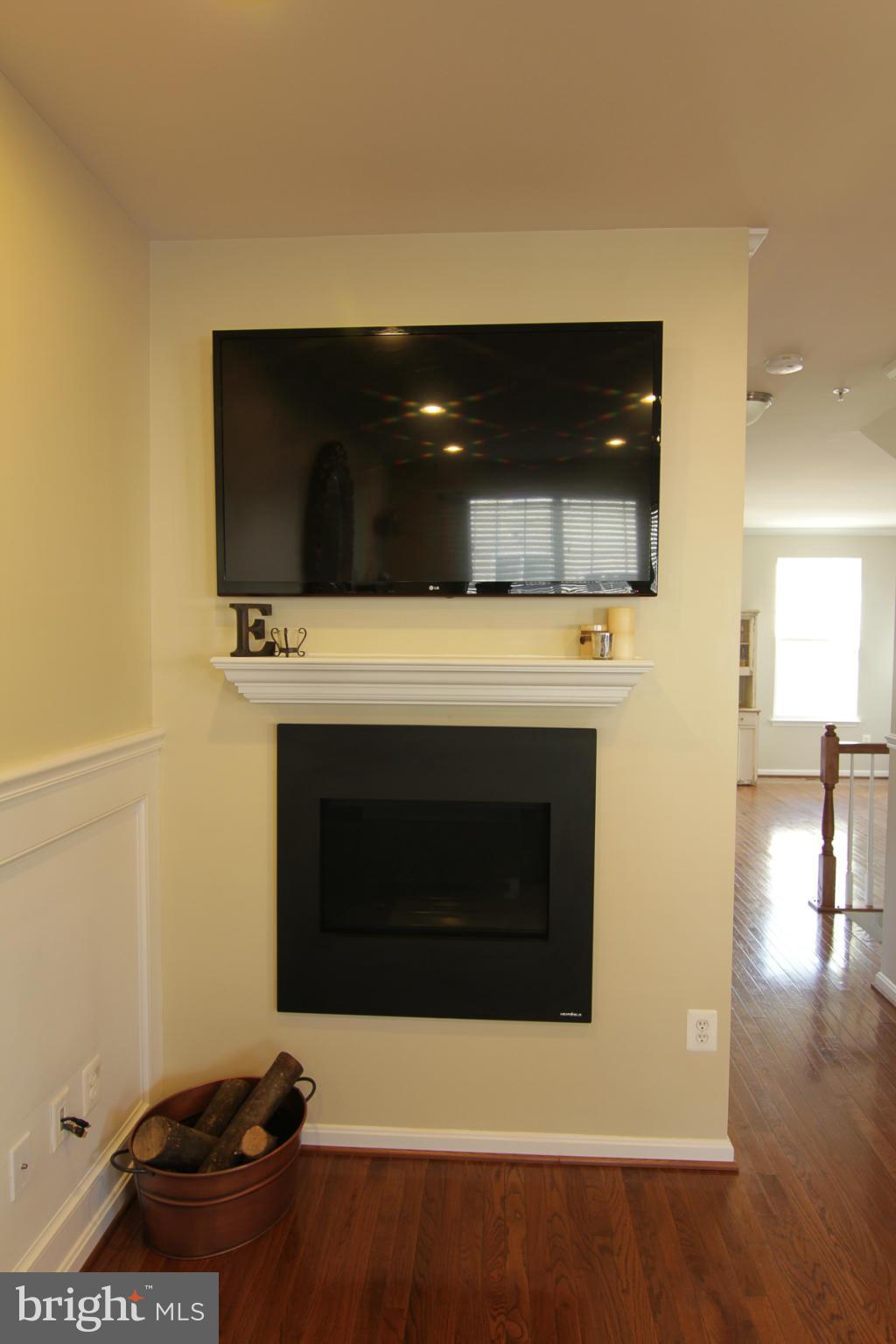 2651 Shade Branch Road Hanover, MD 21076 - Photo 19 of 30 a living room with a fireplace