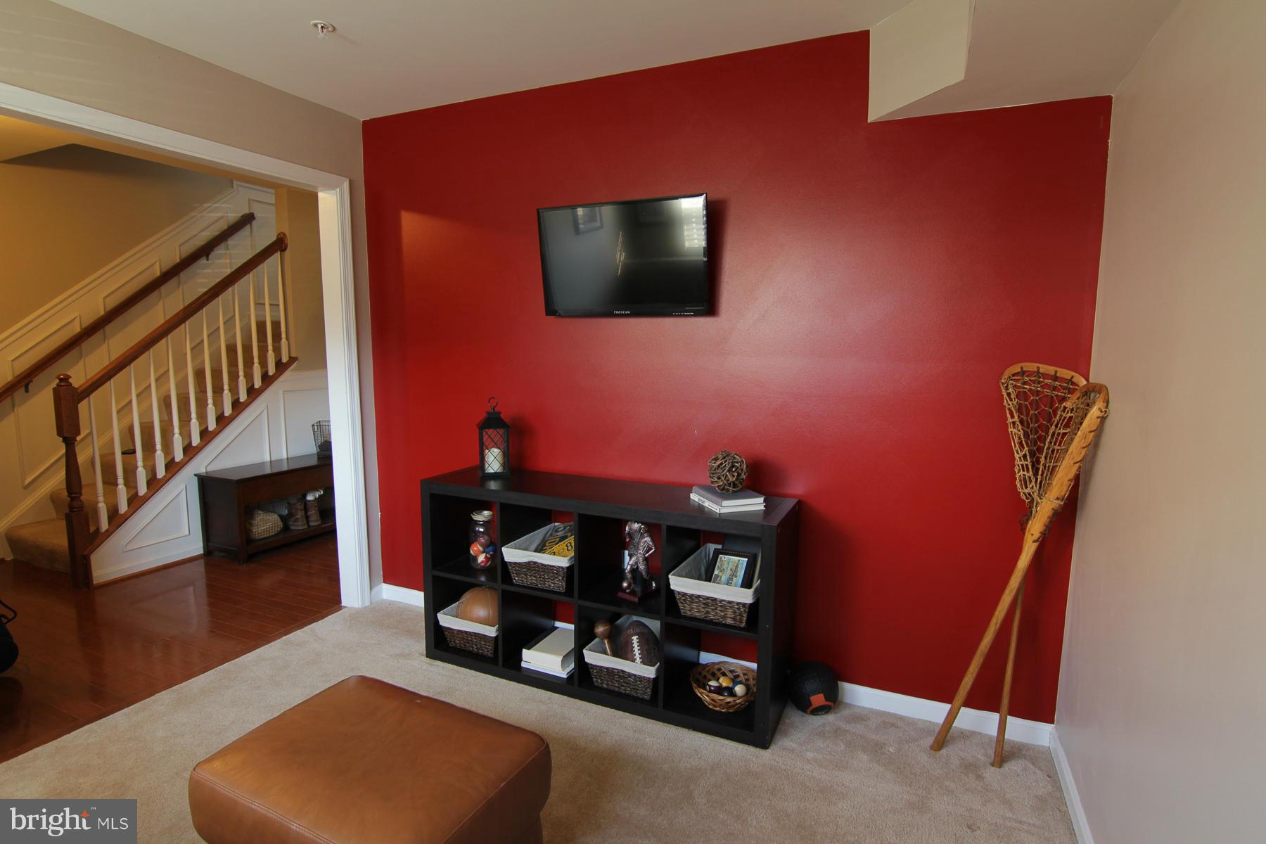 2651 Shade Branch Road Hanover, MD 21076 - Photo 20 of 30 a room with furniture and a flat screen tv