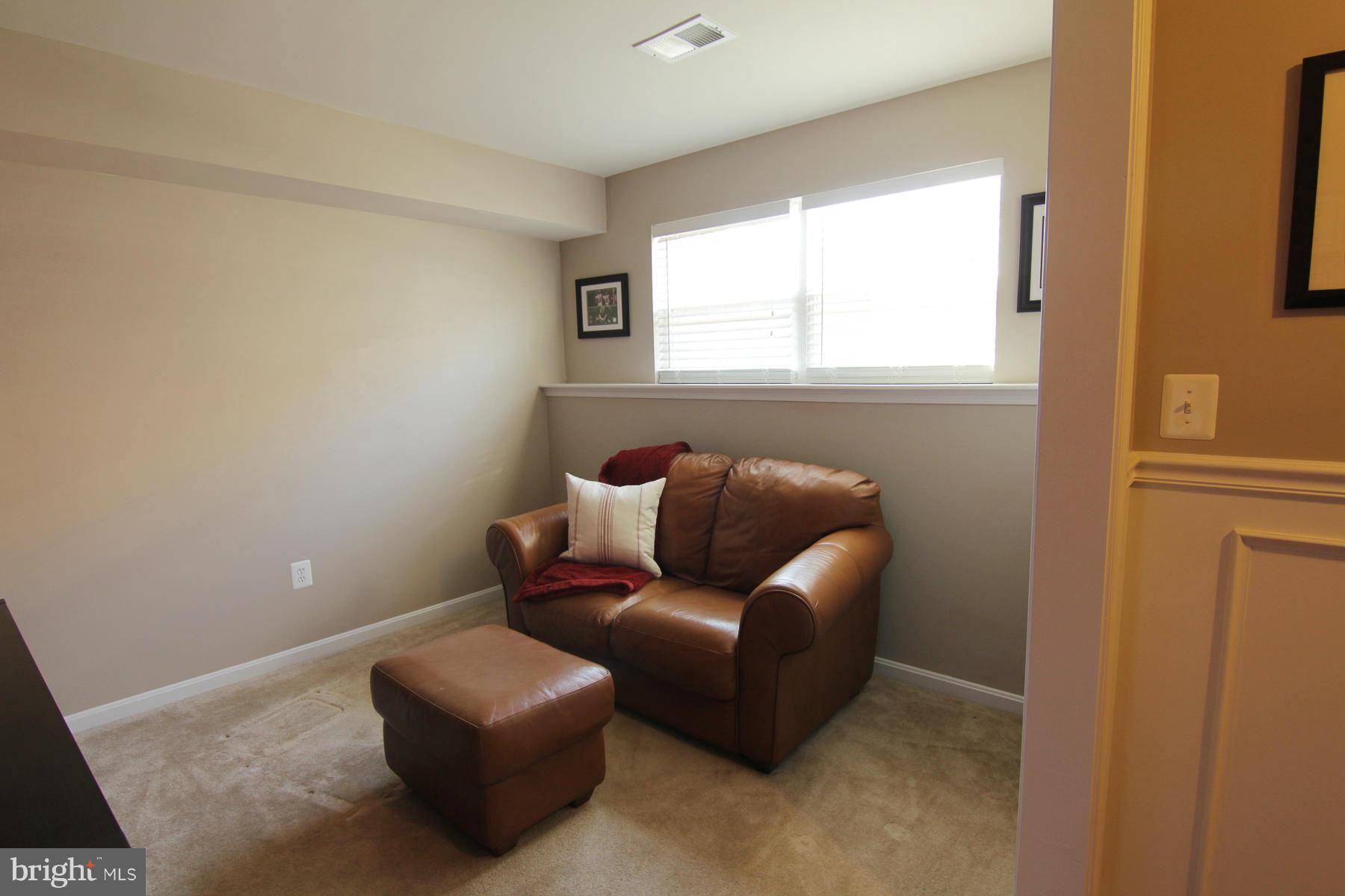 2651 Shade Branch Road Hanover, MD 21076 - Photo 26 of 30 a living room with furniture and a window