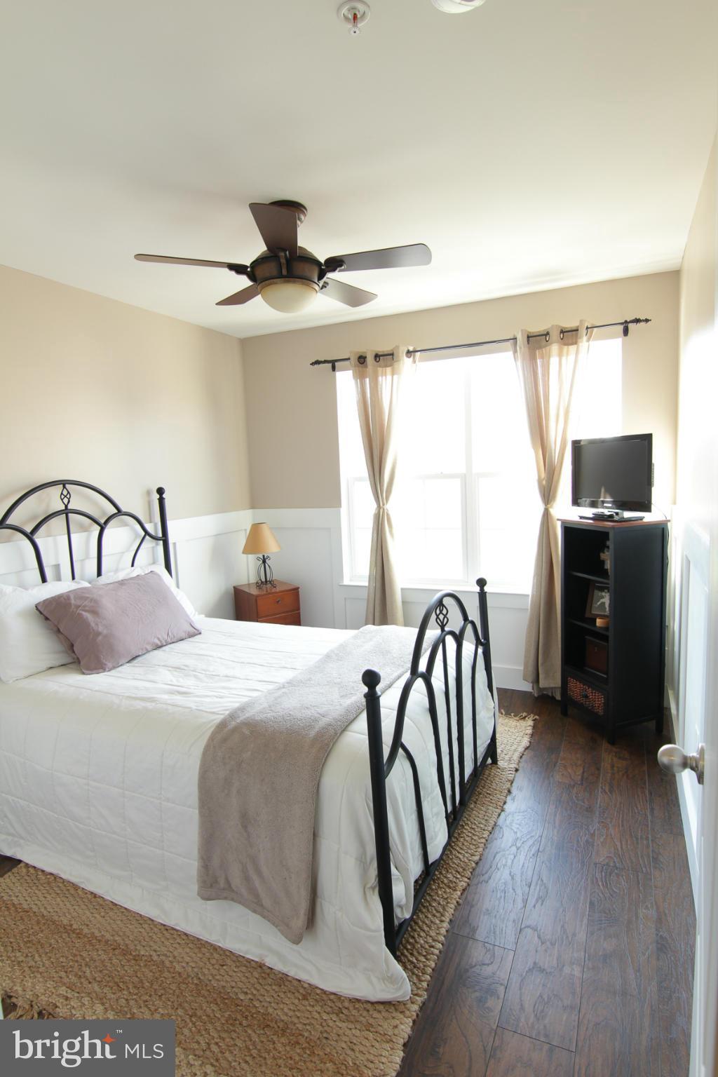 2651 Shade Branch Road Hanover, MD 21076 - Photo 9 of 30 a bedroom with a bed and a table