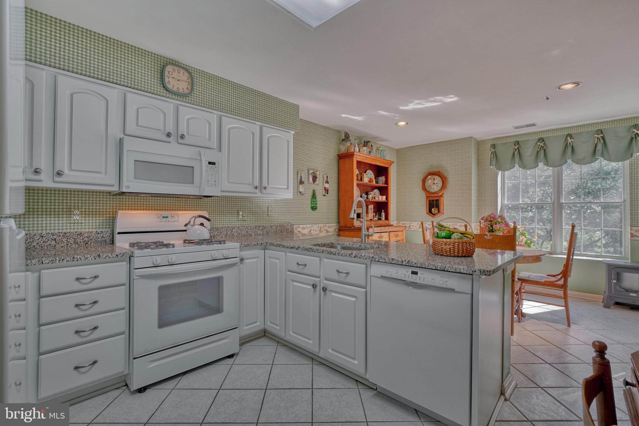 12320 Rosslare Ridge Road, Unit 206 Lutherville-Timonium, MD 21093 - Photo 11 of 28 Kitchen looking into breakfast room
