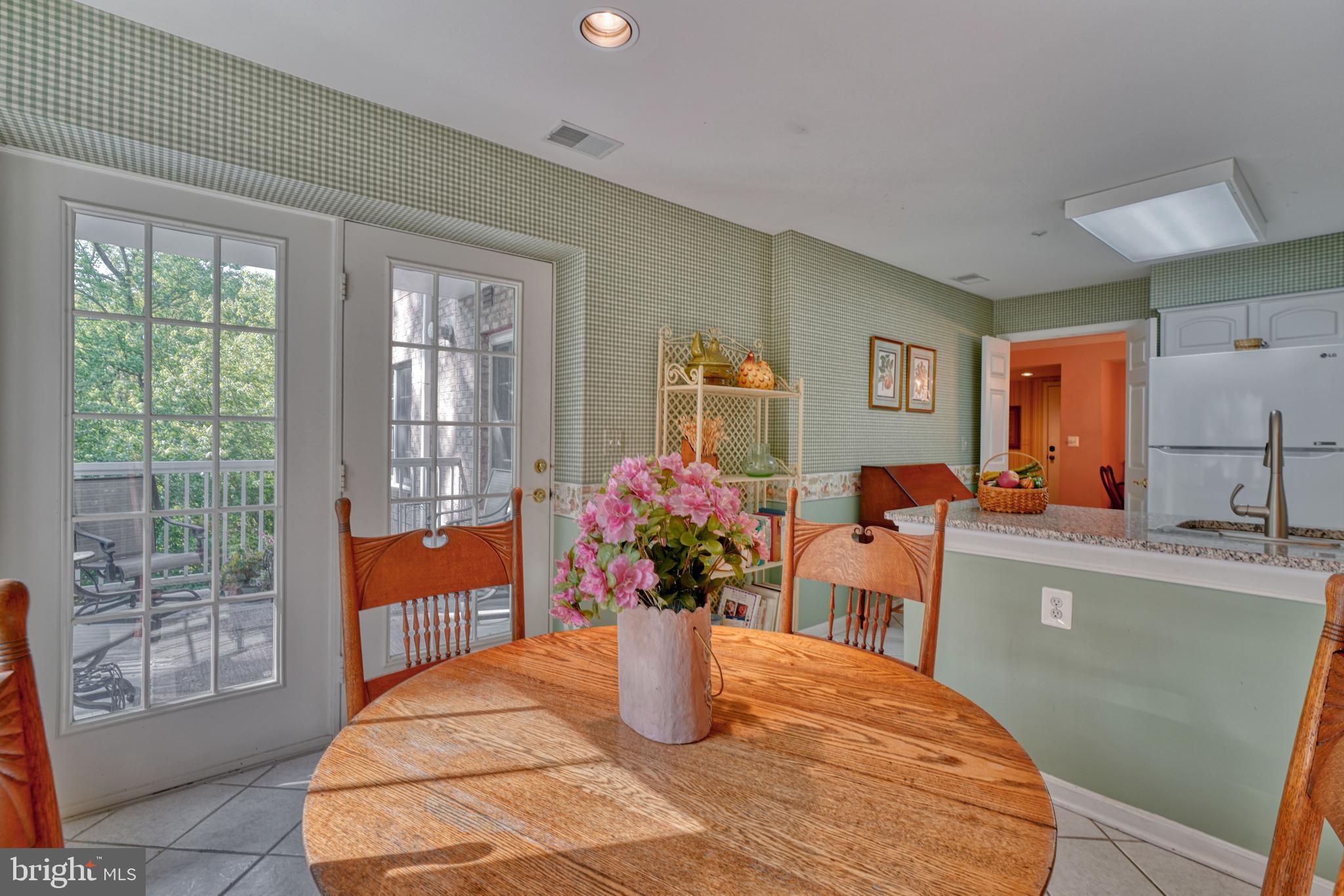 12320 Rosslare Ridge Road, Unit 206 Lutherville-Timonium, MD 21093 - Photo 13 of 28 Breakfast Room with double doors to balcony