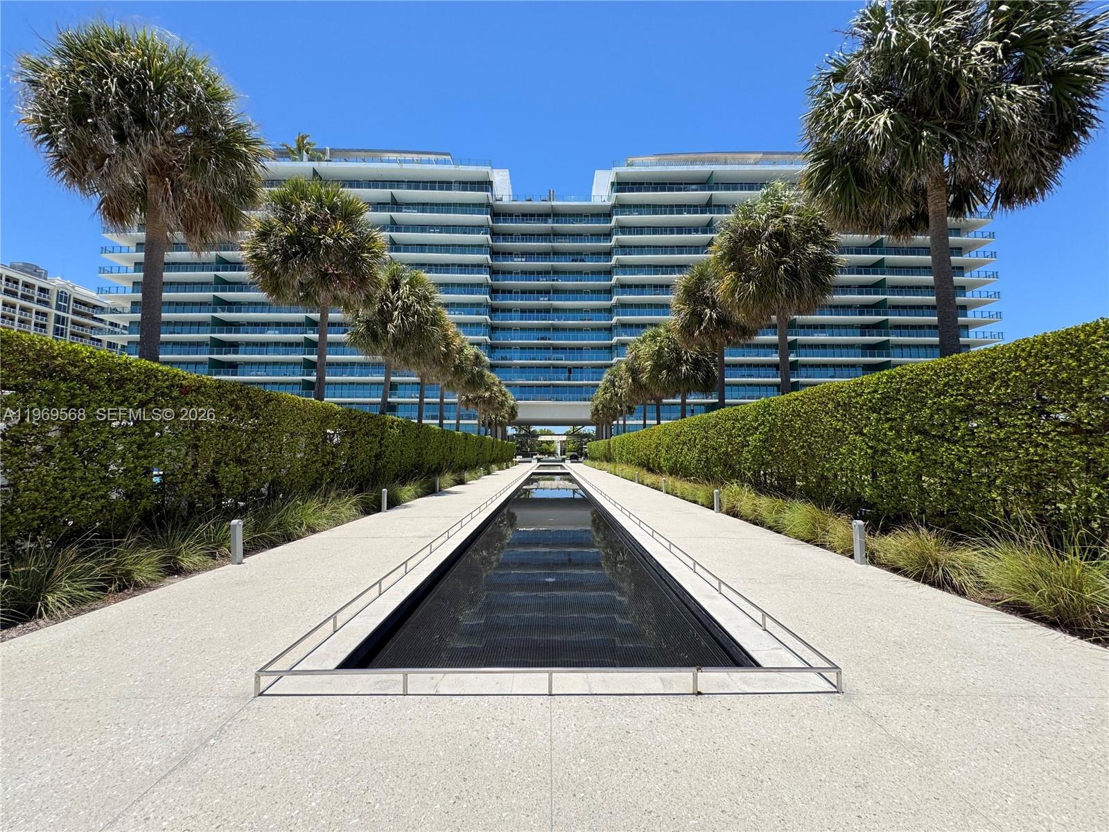 350 Ocean Drive, Unit 406N Key Biscayne, FL 33149 - Photo 40 of 41 a view of outside space and a yard