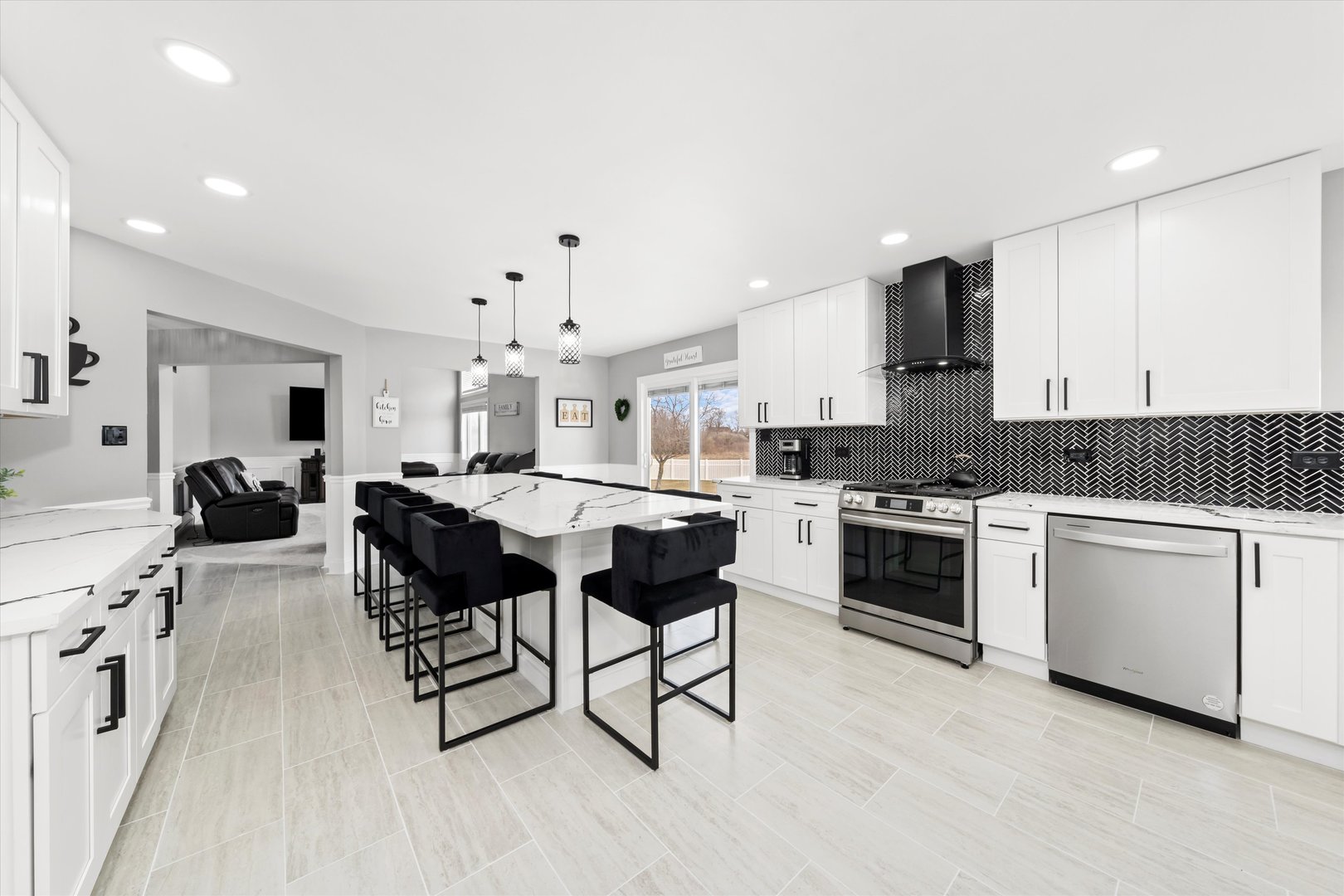 110 Sky View Lane Beecher, IL 60401 - Photo 13 of 53 a kitchen with granite countertop white cabinets and stainless steel appliances