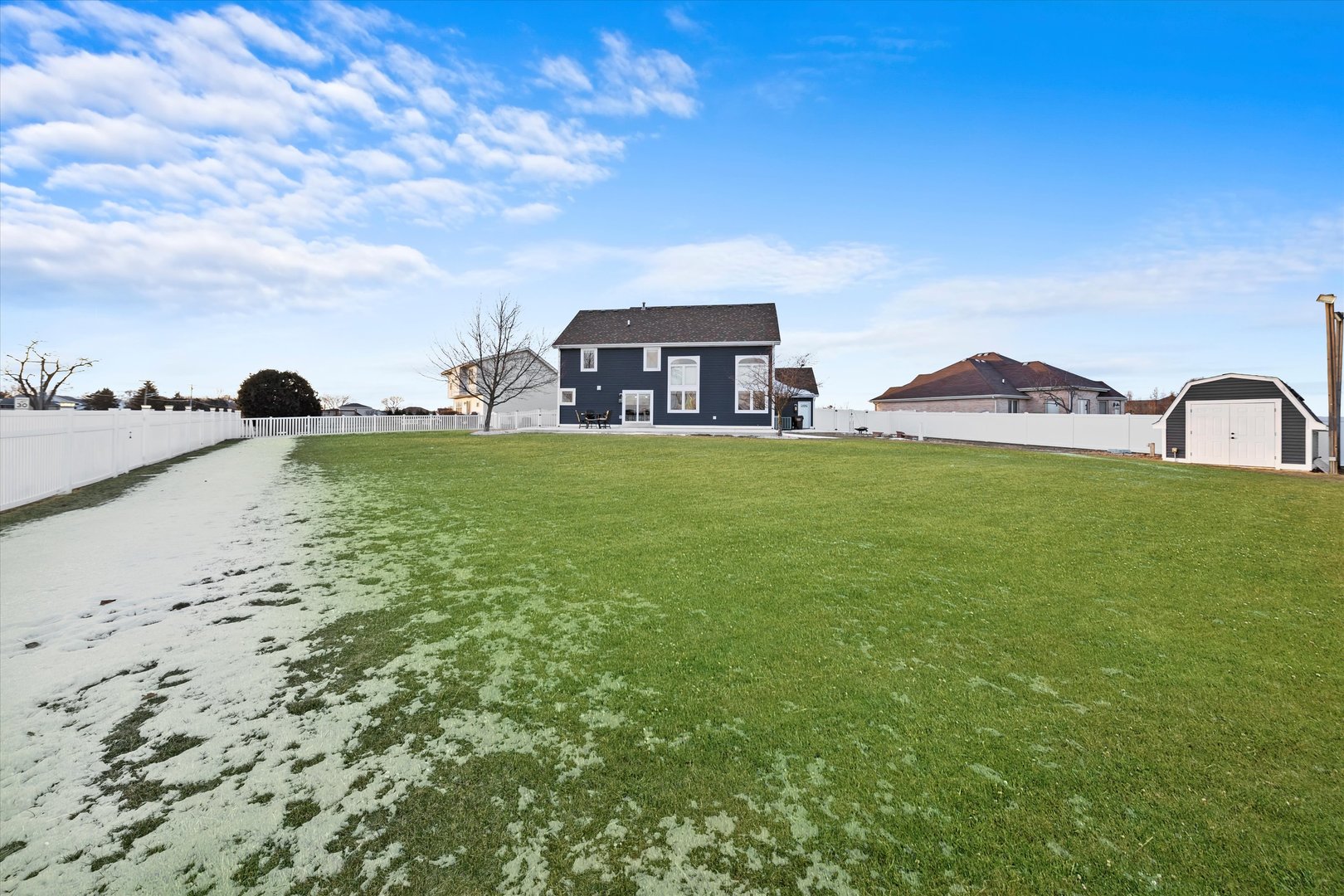 110 Sky View Lane Beecher, IL 60401 - Photo 47 of 53 a view of a big house with a big yard and a large tree