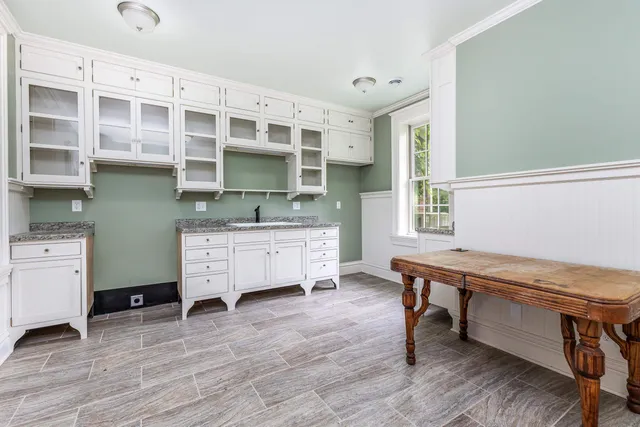 a room with a desk and chair