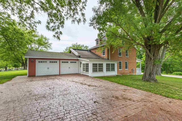 a house with trees in front of it