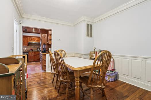 1637 Pennington Road Ewing, NJ 08618 - Photo 15 of 56 a dining room with furniture and wooden floor