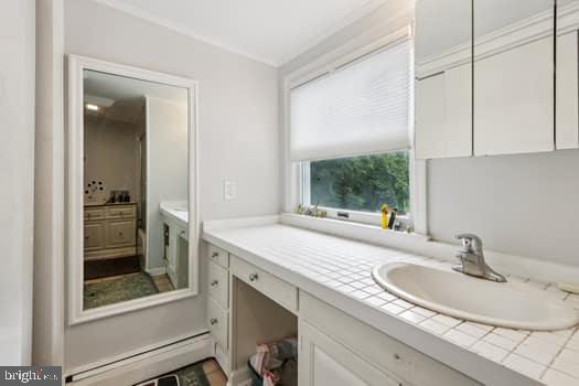 1637 Pennington Road Ewing, NJ 08618 - Photo 17 of 56 a bathroom with a sink and a mirror