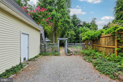 1637 Pennington Road Ewing, NJ 08618 - Photo 38 of 56 a backyard of a house with lots of green space and trees