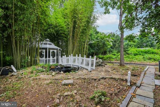 1637 Pennington Road Ewing, NJ 08618 - Photo 43 of 56 a front view of a house with garden