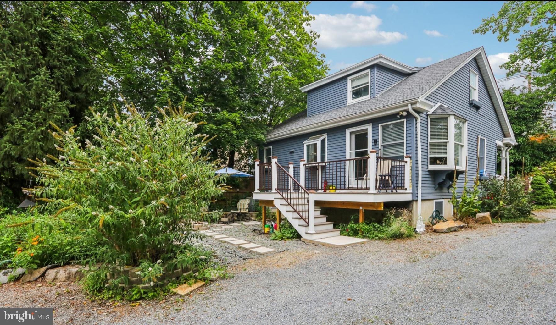 1637 Pennington Road Ewing, NJ 08618 - Photo 54 of 56 a front view of a house with yard and green space