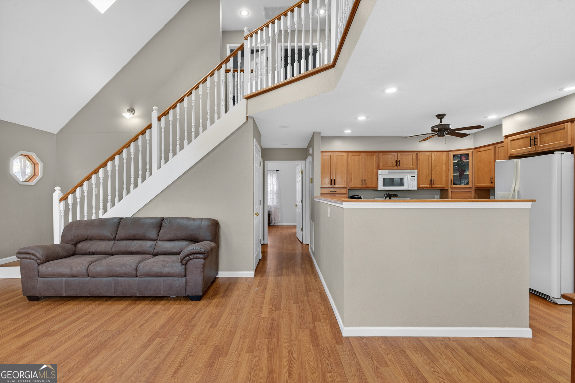 756 Gordon Thomas Road Blairsville, GA 30512 - Photo 14 of 65 a living room with furniture and a wooden floor