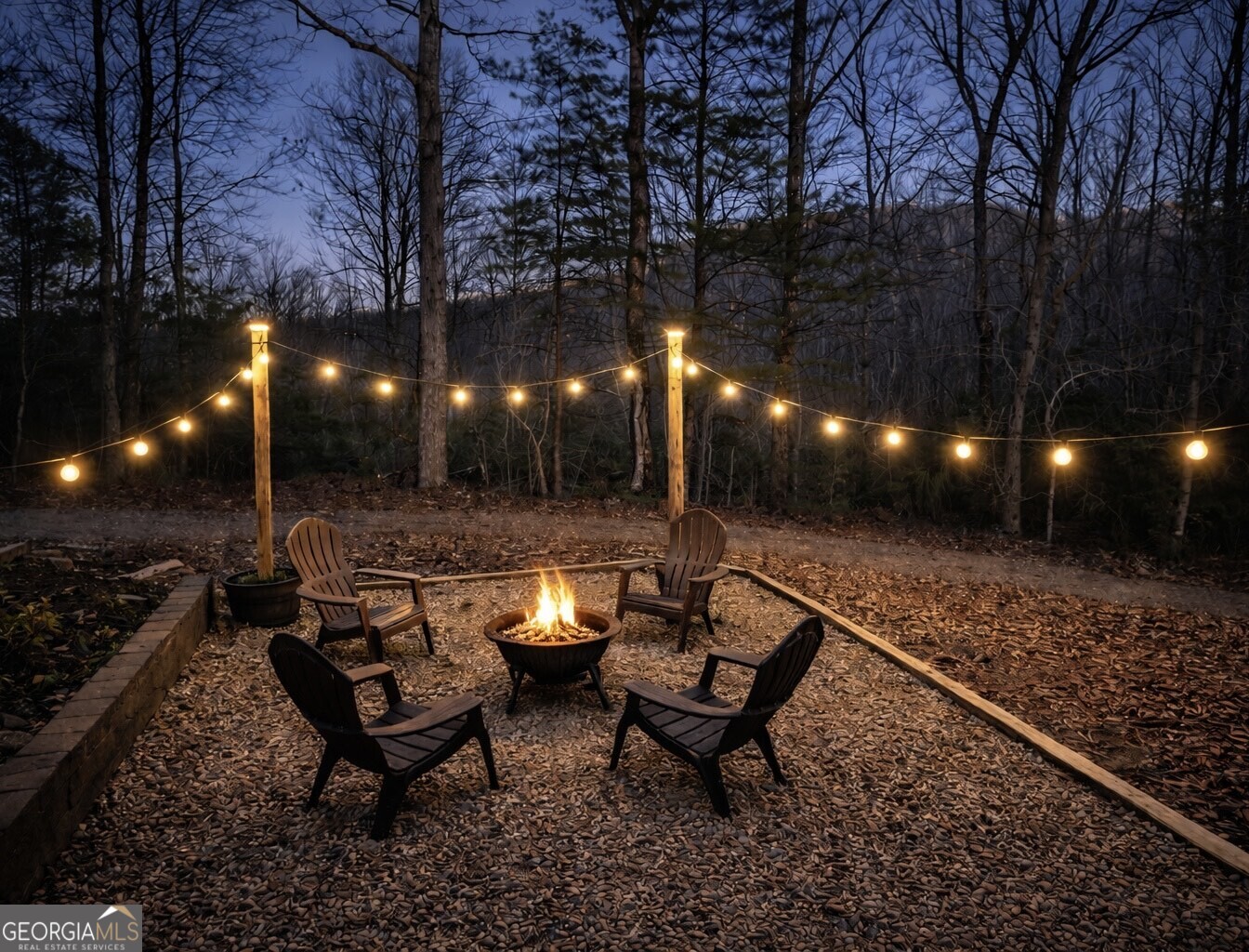 756 Gordon Thomas Road Blairsville, GA 30512 - Photo 2 of 65 a view of a bench in a backyard