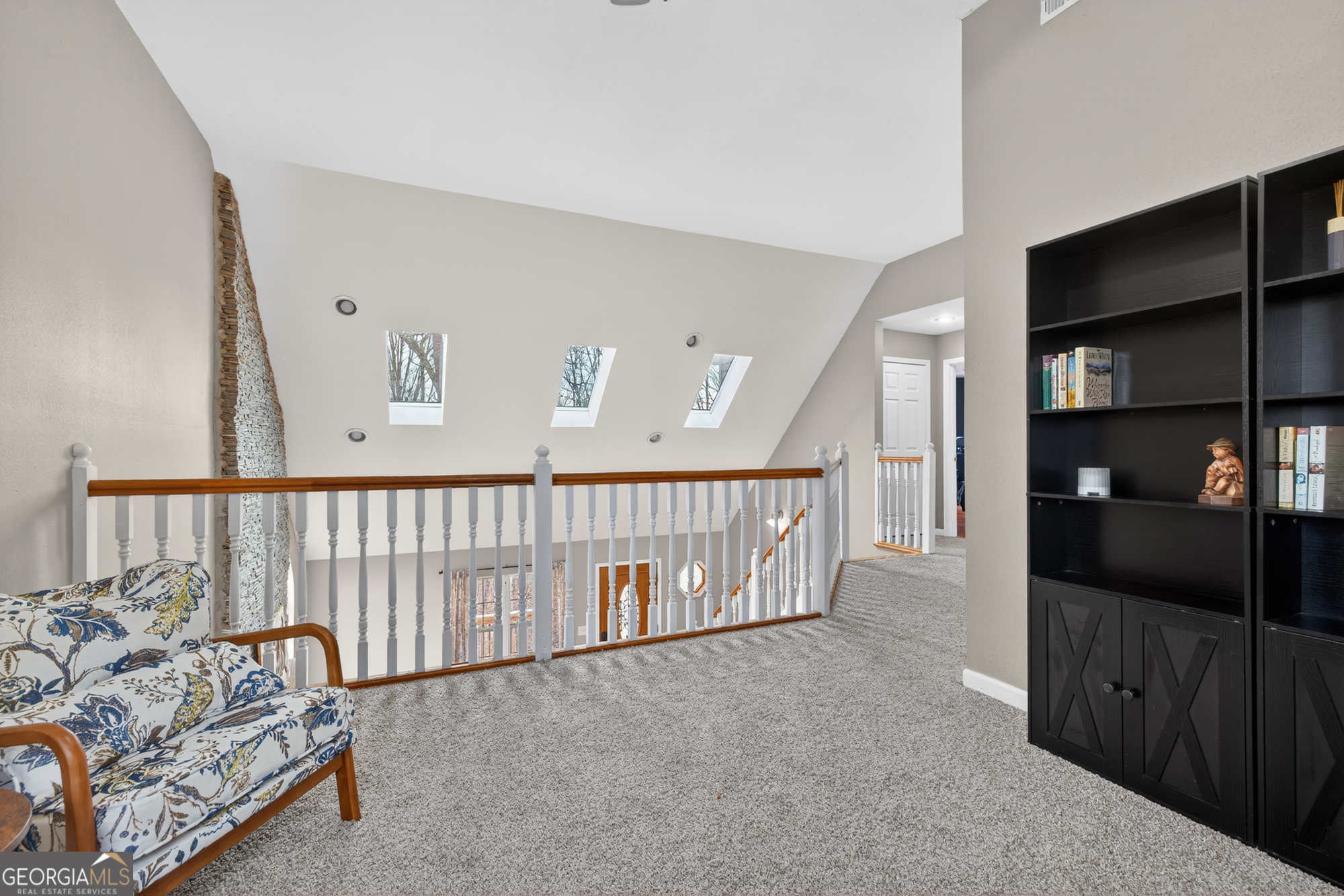 756 Gordon Thomas Road Blairsville, GA 30512 - Photo 25 of 65 a view of a hallway to room with wooden floor and windows