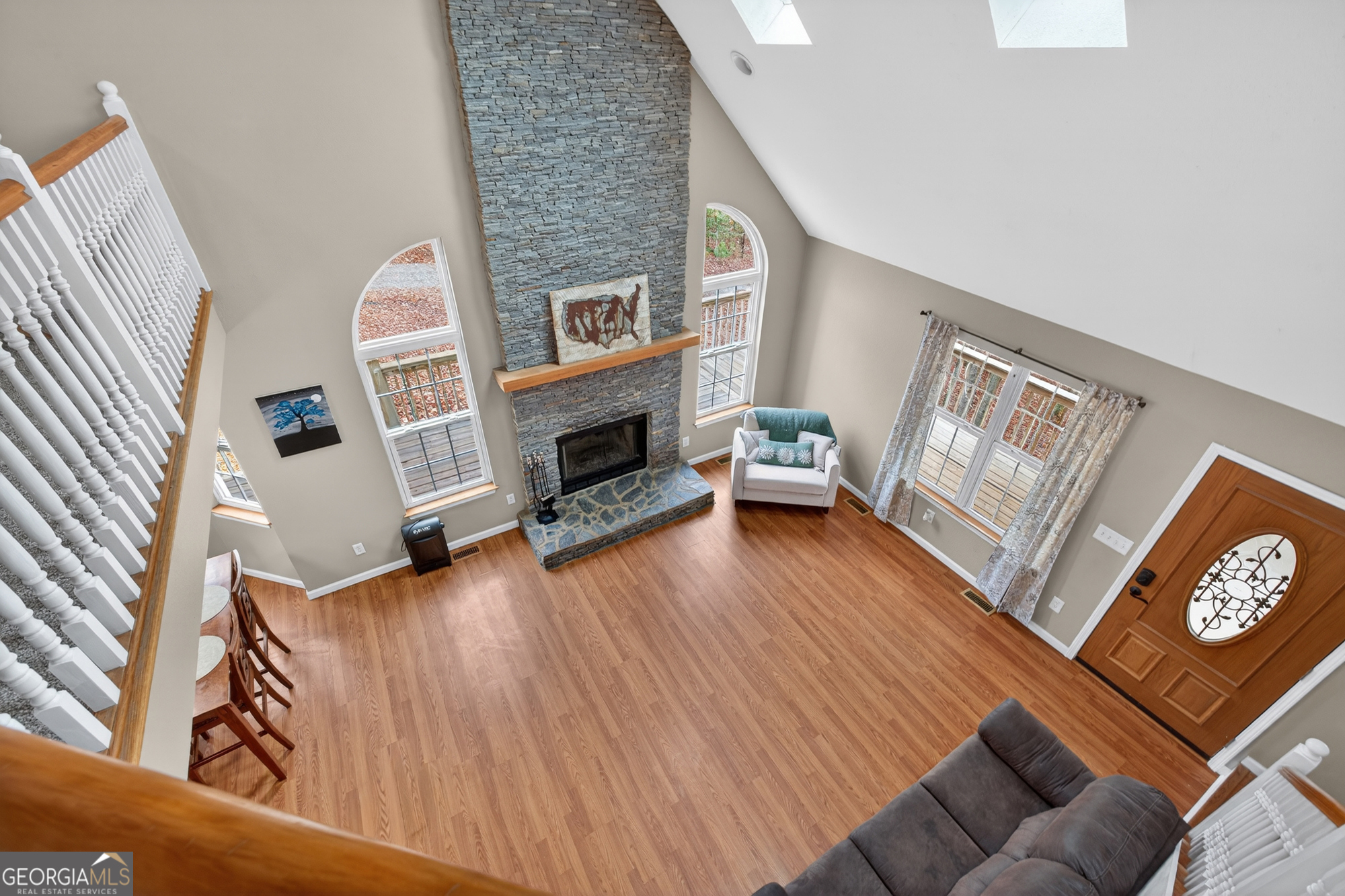 756 Gordon Thomas Road Blairsville, GA 30512 - Photo 33 of 65 a living room with furniture and a fireplace
