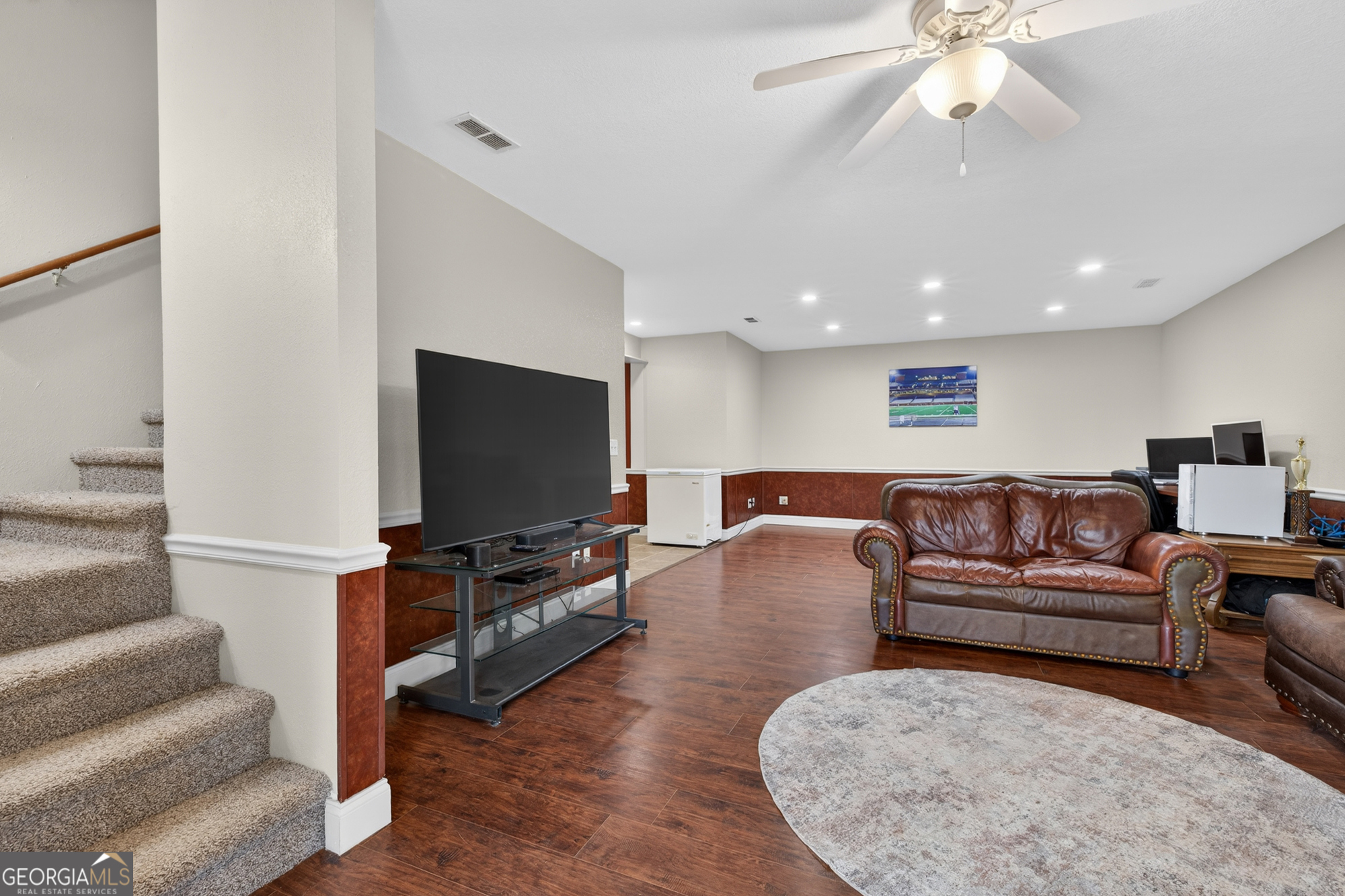756 Gordon Thomas Road Blairsville, GA 30512 - Photo 35 of 65 a living room with furniture and a flat screen tv