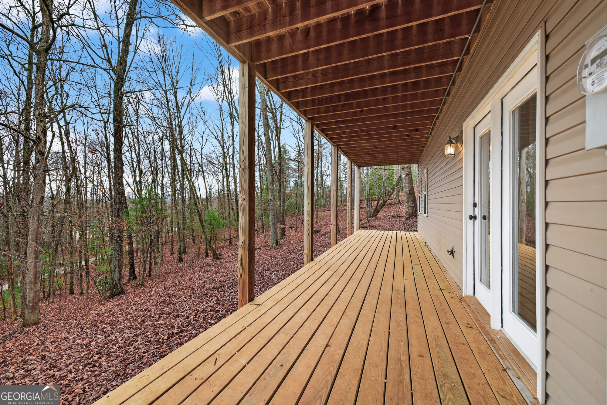 756 Gordon Thomas Road Blairsville, GA 30512 - Photo 42 of 65 a view of backyard with a wooden deck and floor