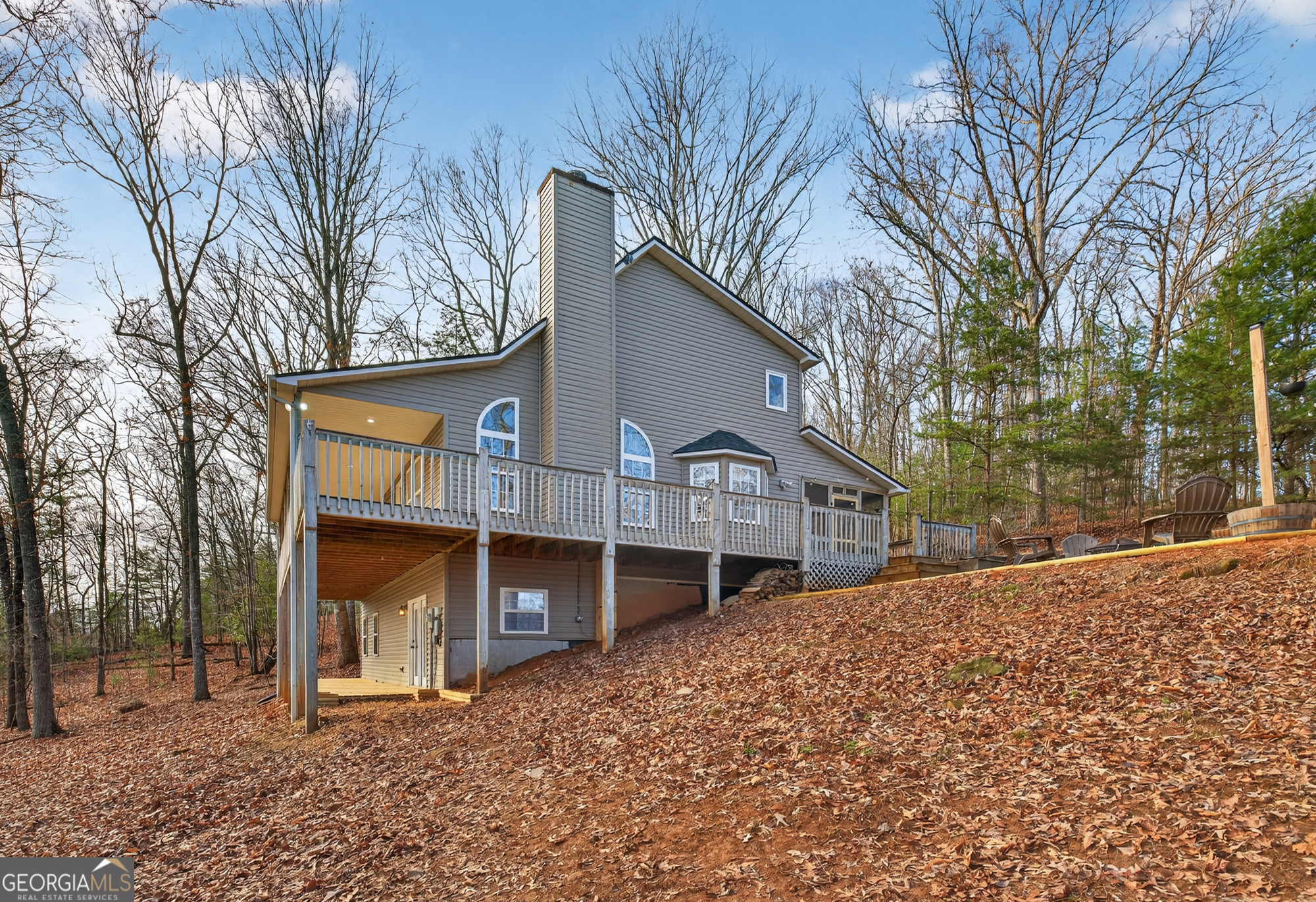 756 Gordon Thomas Road Blairsville, GA 30512 - Photo 45 of 65 a front view of a house with a yard and large tree