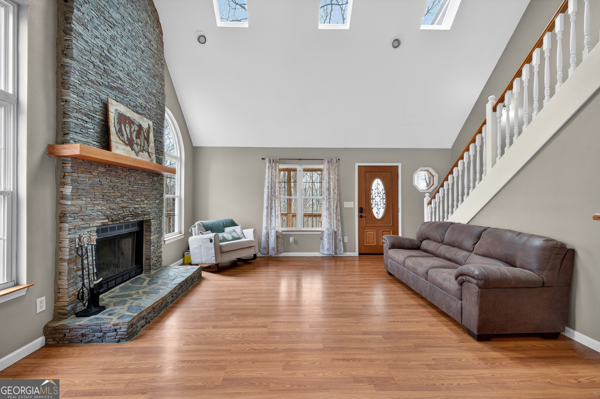 756 Gordon Thomas Road Blairsville, GA 30512 - Photo 5 of 65 a living room with furniture and a fireplace