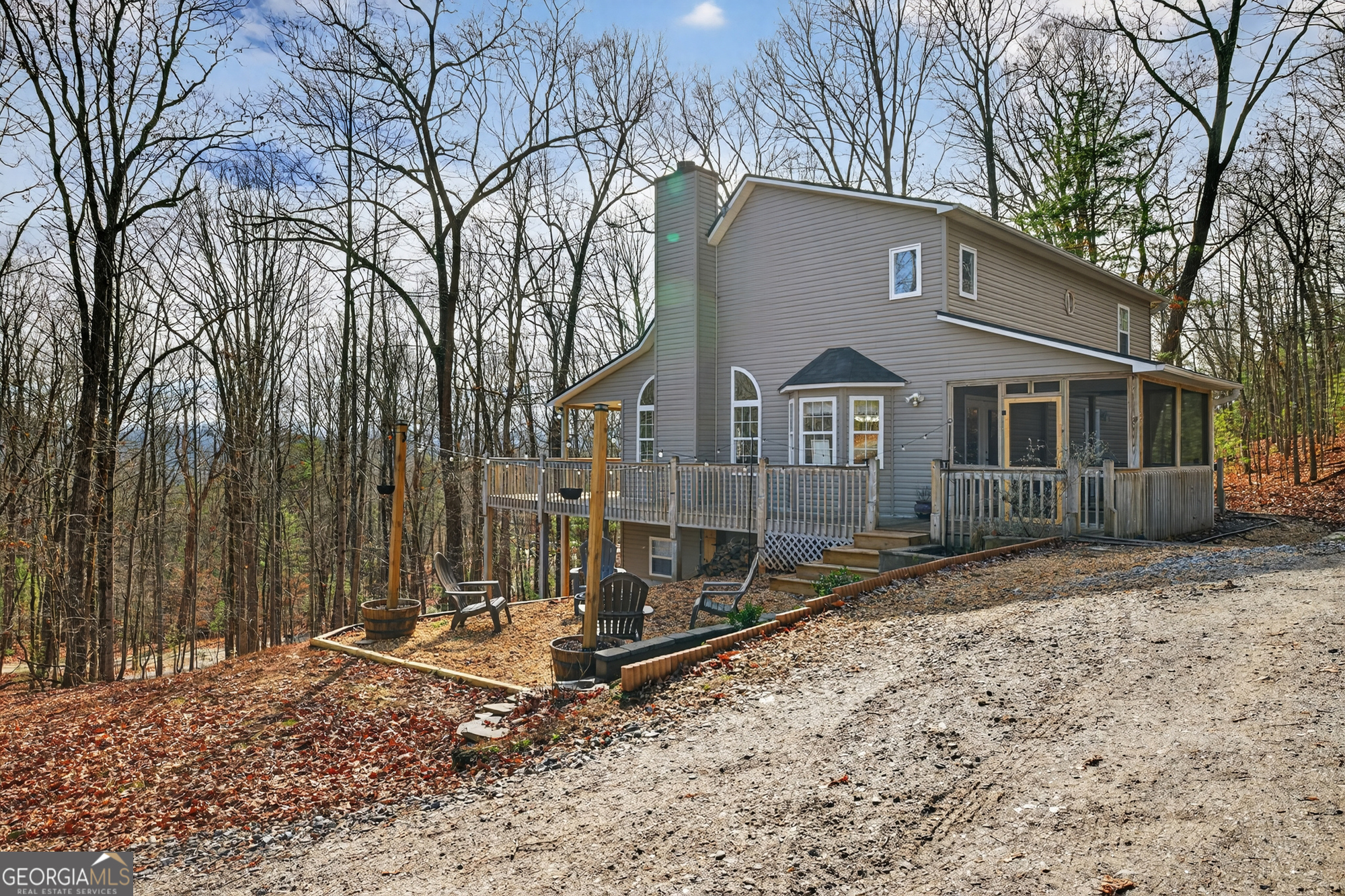 756 Gordon Thomas Road Blairsville, GA 30512 - Photo 60 of 65 a front view of a house with a yard and garage