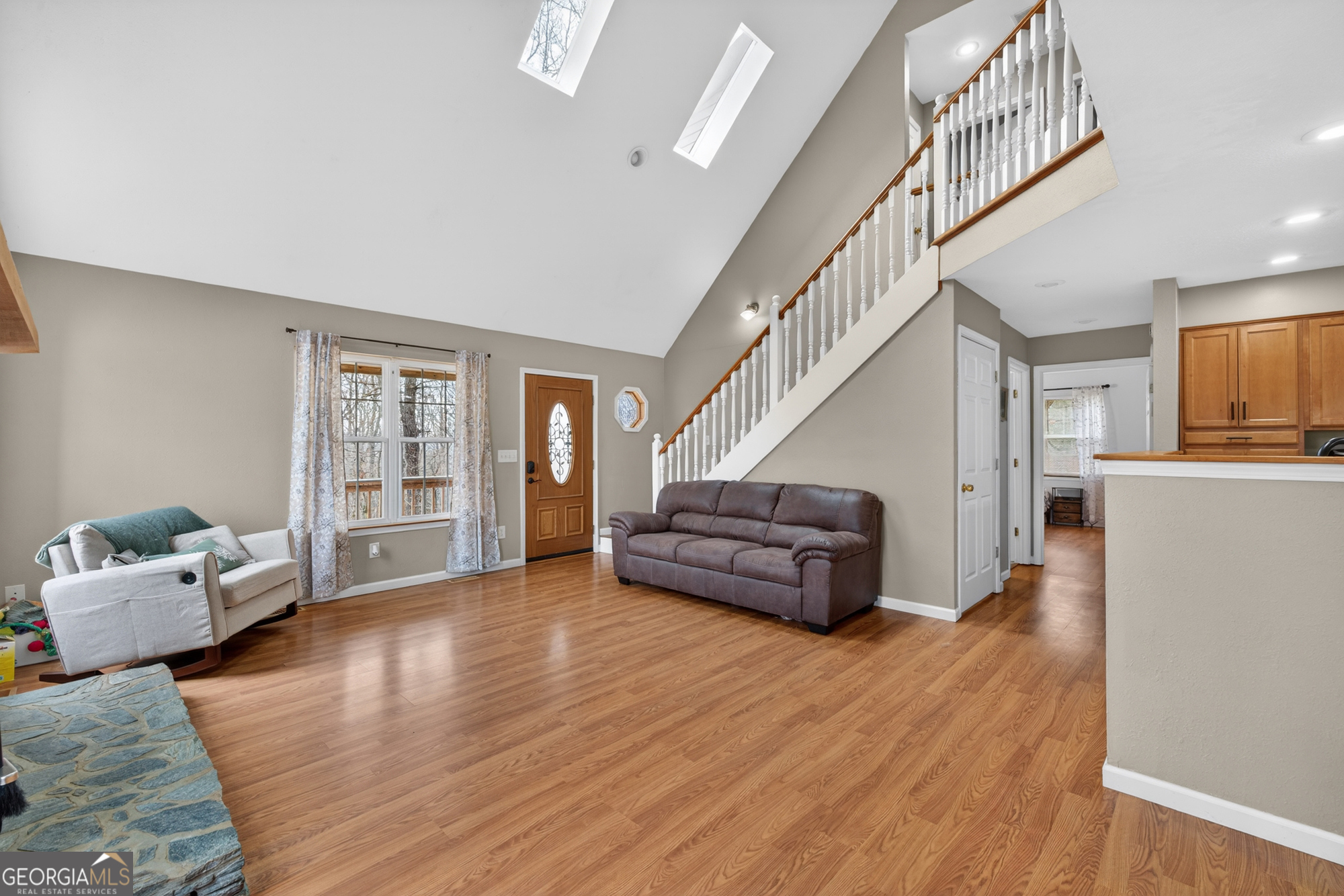 756 Gordon Thomas Road Blairsville, GA 30512 - Photo 6 of 65 a living room with furniture and wooden floor