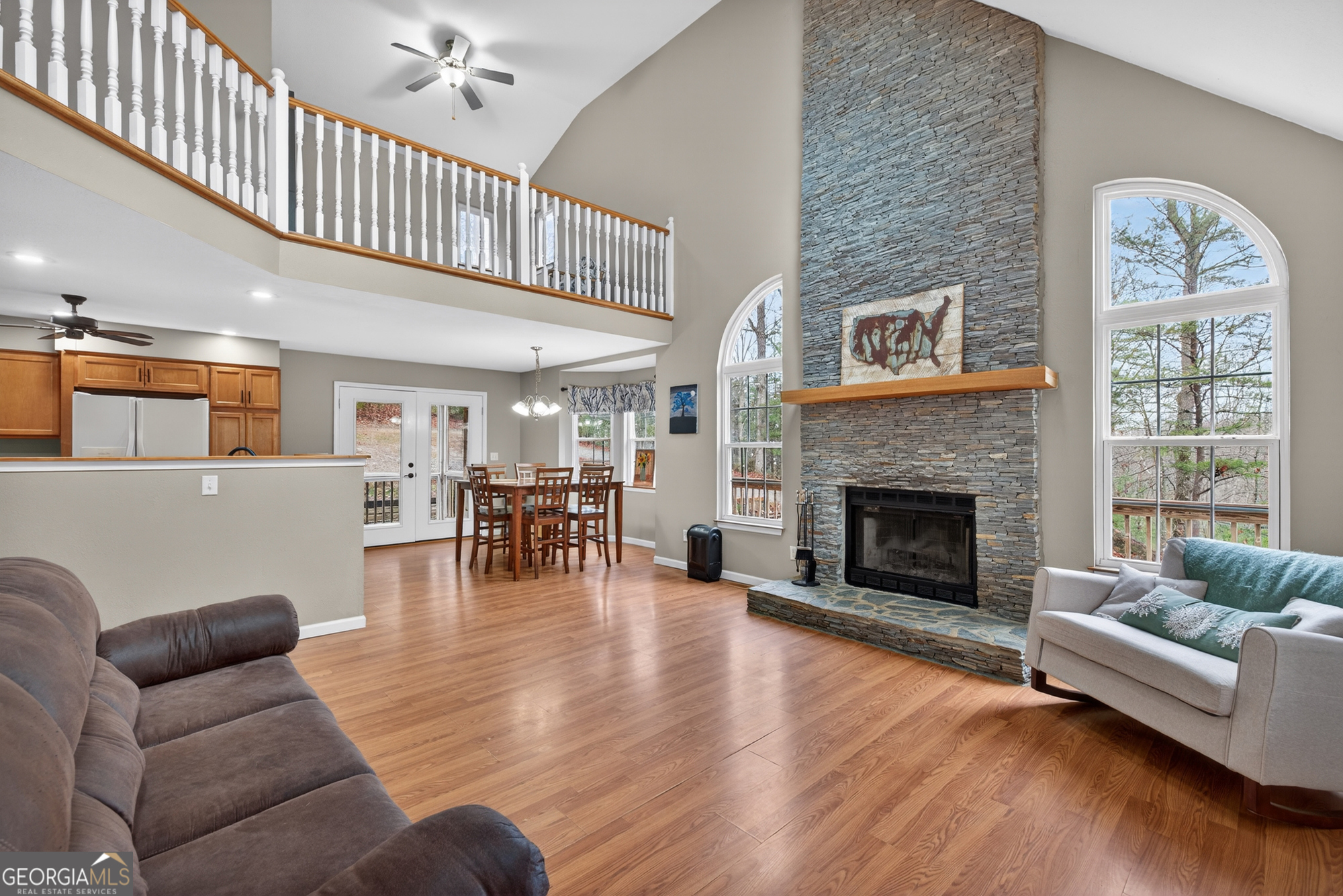 756 Gordon Thomas Road Blairsville, GA 30512 - Photo 7 of 65 a living room with furniture or fireplace and a wooden floor