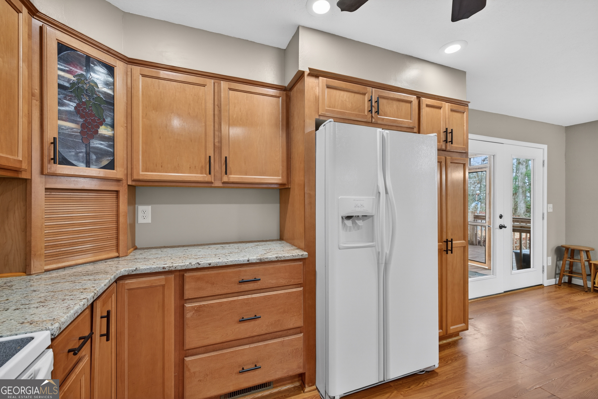 756 Gordon Thomas Road Blairsville, GA 30512 - Photo 9 of 65 a kitchen with stainless steel appliances granite countertop a refrigerator and a stove top oven