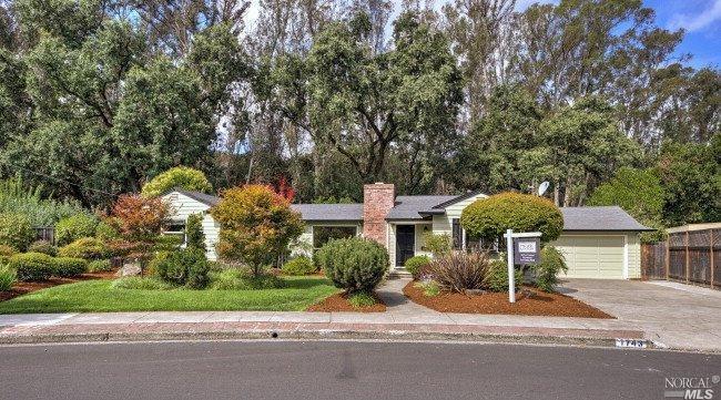 1743 Terrace Way Santa Rosa, CA 95404 - Photo 1 of 1 a front view of a house with a yard and fountain
