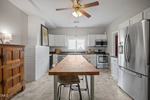 a room that has a bed and a chair