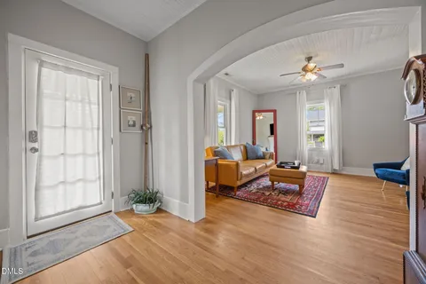 a spacious bathroom with a double vanity sink and a window
