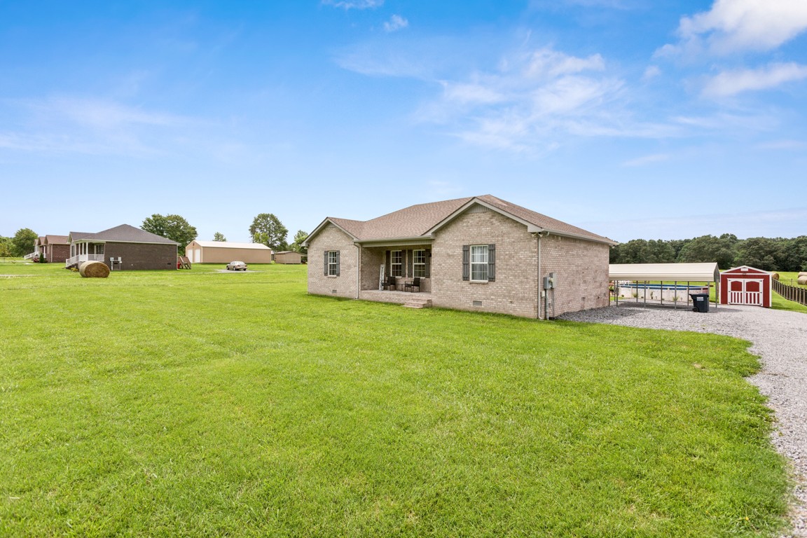 4510 Long Creek Road Lafayette, TN 37083 - Photo 2 of 25 a view of a house with backyard