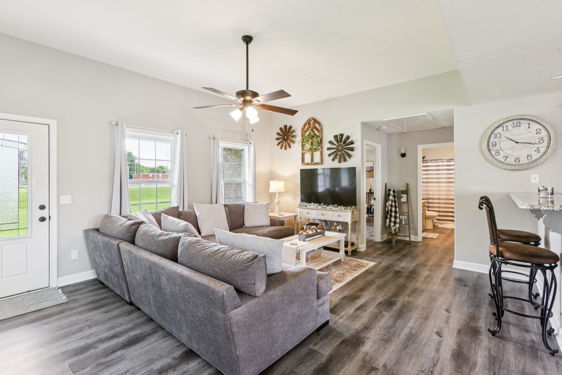 4510 Long Creek Road Lafayette, TN 37083 - Photo 4 of 25 a living room with furniture a fireplace and a window