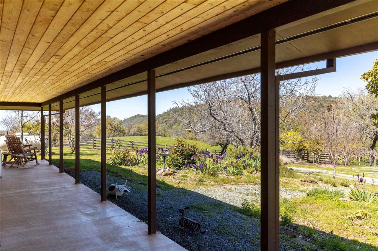 16554 Cocoran Gray Road Groveland, CA 95321 - Photo 15 of 38 Unfurnished sunroom featuring wooden ceiling