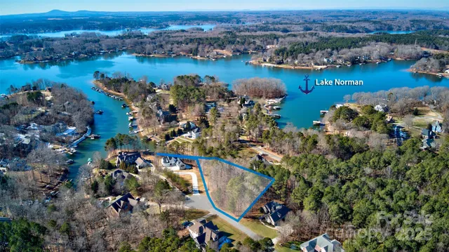 a view of swimming pool from a lake view