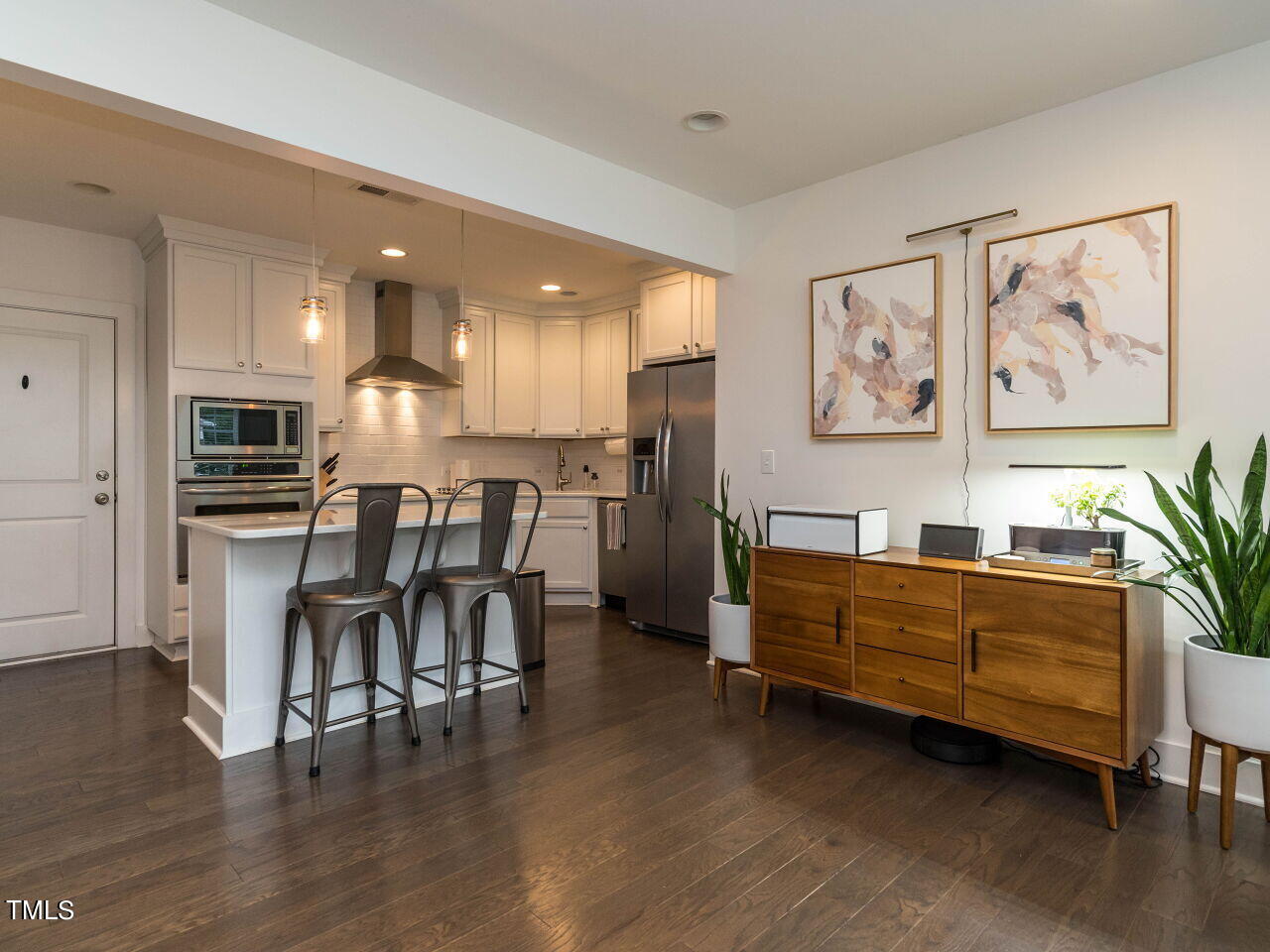 531 North Person Street, Unit 105 Raleigh, NC 27604 - Photo 1 of 25 a view of kitchen with cabinets and furniture