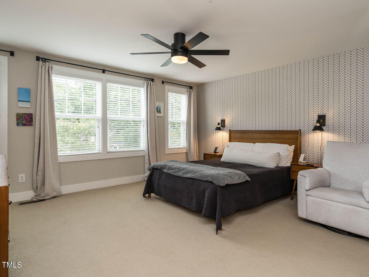 531 North Person Street, Unit 105 Raleigh, NC 27604 - Photo 15 of 25 a bedroom with a bed and window