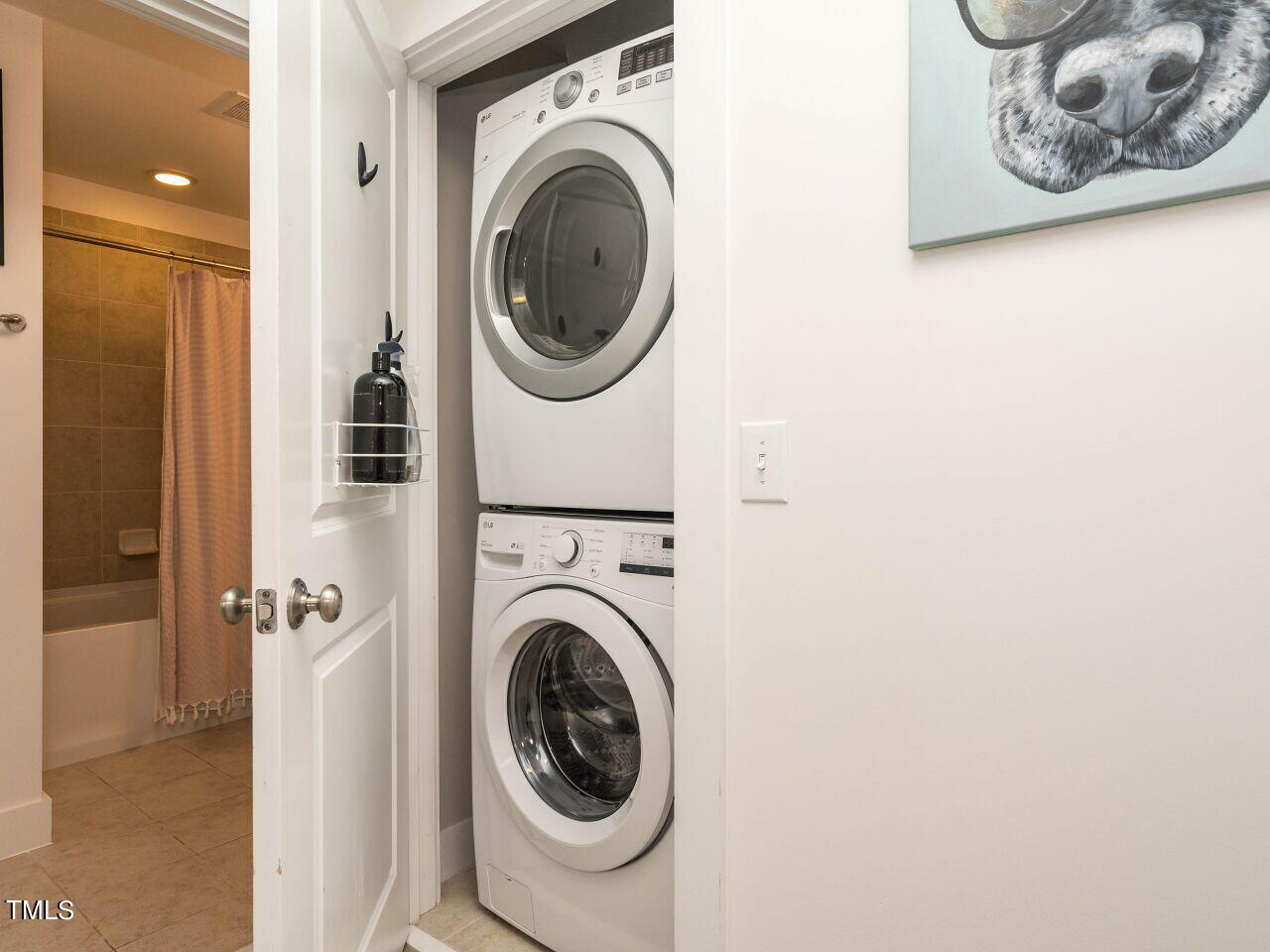 531 North Person Street, Unit 105 Raleigh, NC 27604 - Photo 21 of 25 a utility room with dryer and washer