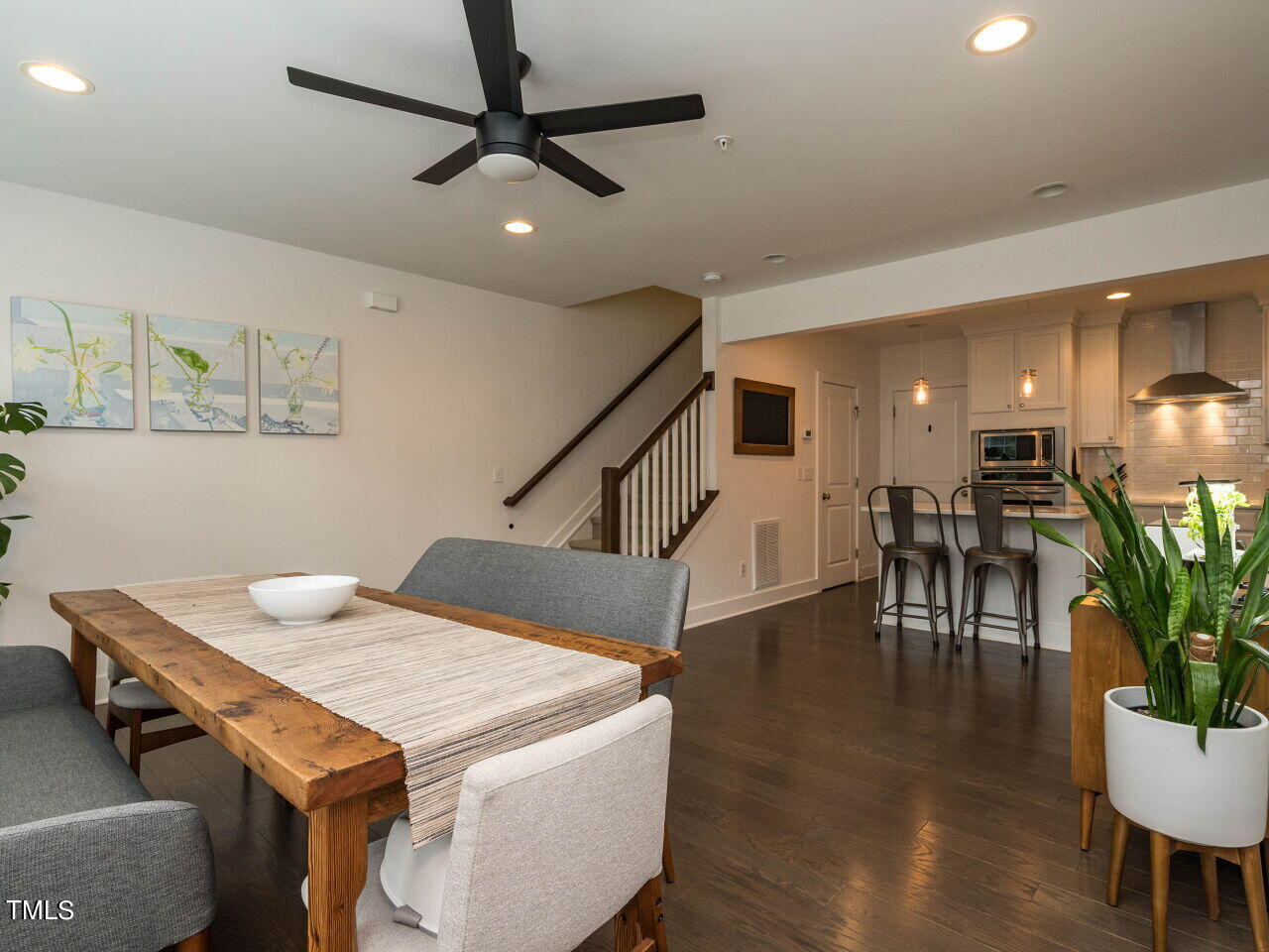531 North Person Street, Unit 105 Raleigh, NC 27604 - Photo 5 of 25 a dining room with furniture and a livingroom