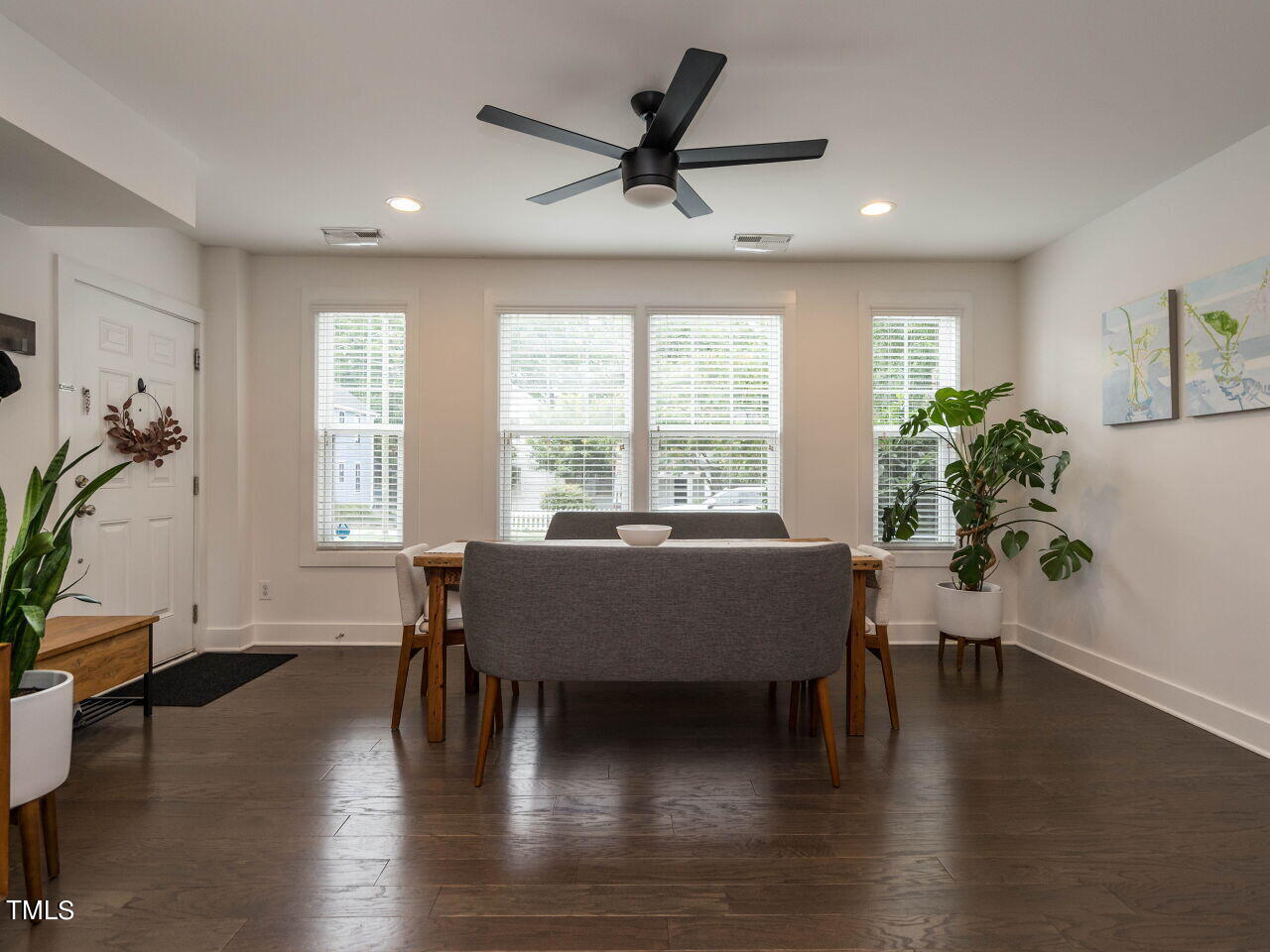 531 North Person Street, Unit 105 Raleigh, NC 27604 - Photo 7 of 25 a dining room with furniture window wooden floor