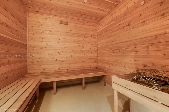 a room with lots of table and a wooden floor