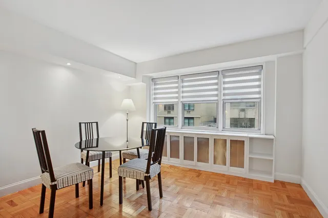 a workspace with furniture and window