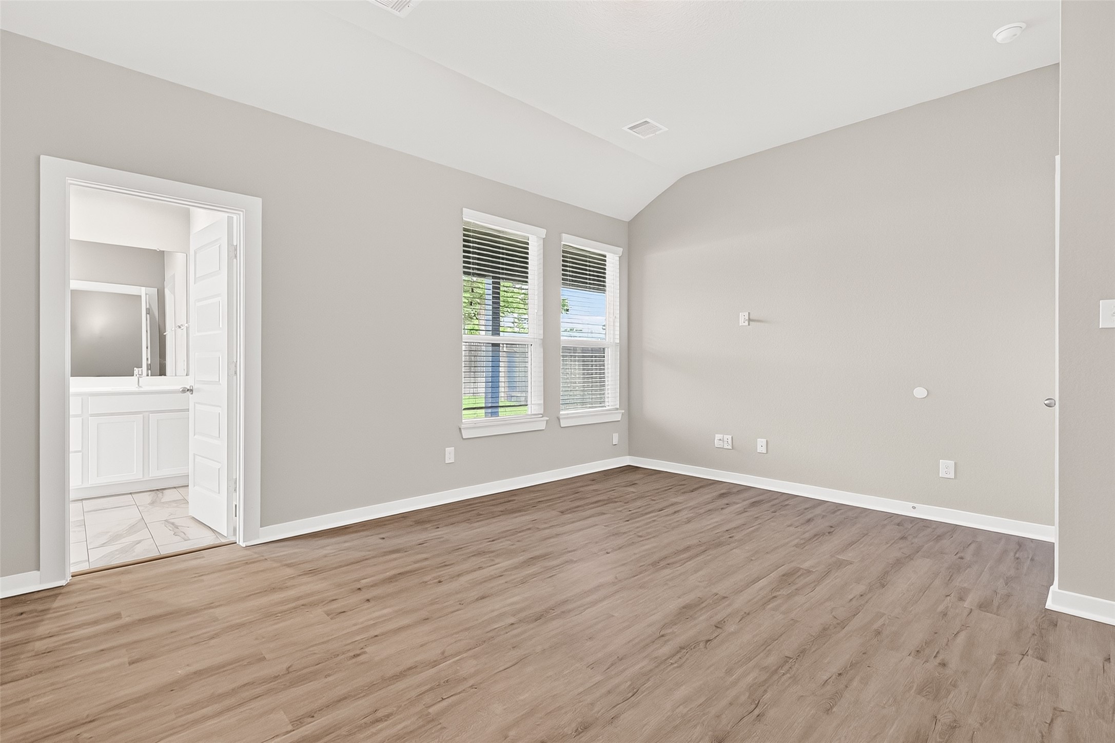2142 Reed Cave Lane Spring, TX 77386 - Photo 25 of 50 wooden floor in an empty room with a window