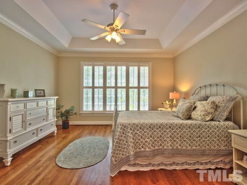 164 Yorkchester Way, Unit 13 Raleigh, NC 27615 - Photo 11 of 23 a bedroom with a bed and window