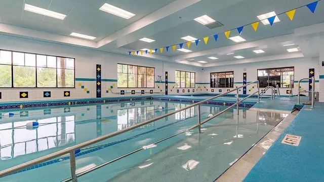 an aerial view of a houses with yard