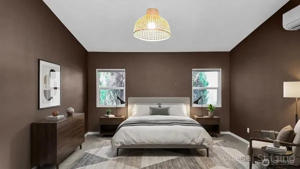 a bedroom with a bed and window
