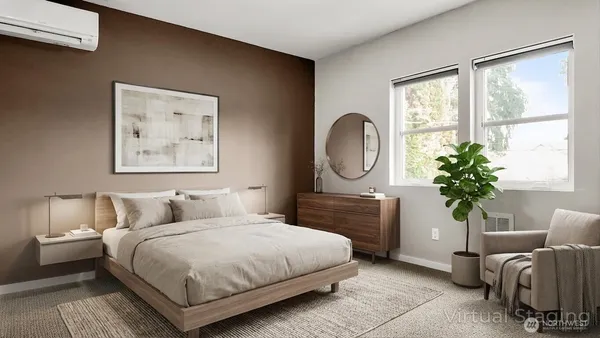a bedroom with a bed a mirror and a window
